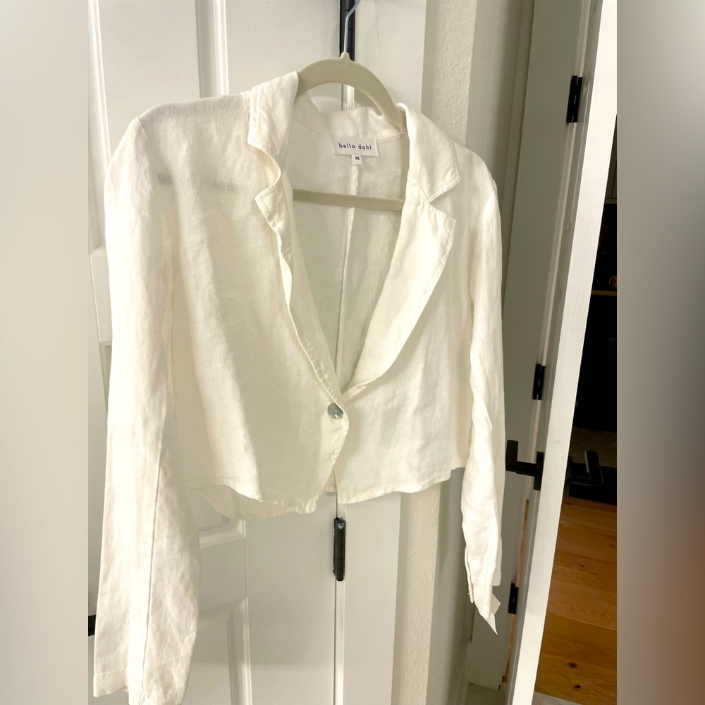 Iconic classic white linen shirt / crop jacket with abalone buttons.